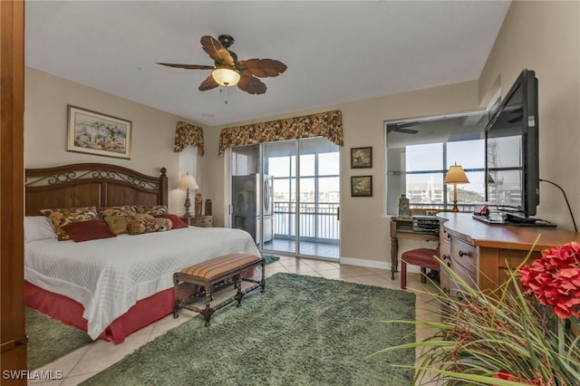 tiled bedroom featuring ceiling fan and access to outside