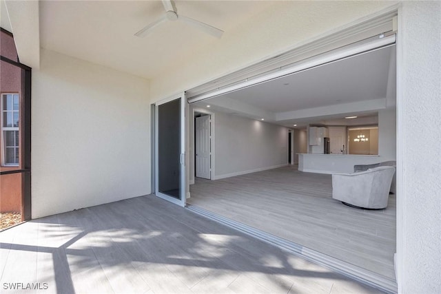 view of patio / terrace with ceiling fan