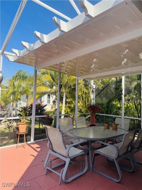 view of patio / terrace with outdoor dining area and a pergola