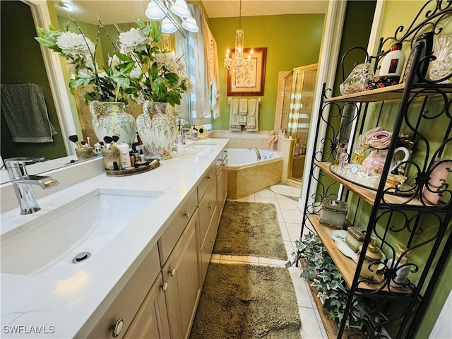 full bath featuring a garden tub, tile patterned flooring, a sink, double vanity, and a stall shower