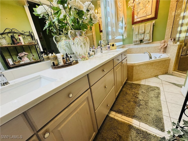 full bathroom with double vanity, a sink, a bath, and tile patterned floors