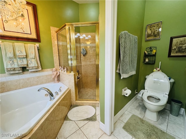 bathroom with toilet, tile patterned flooring, a shower stall, and a bath