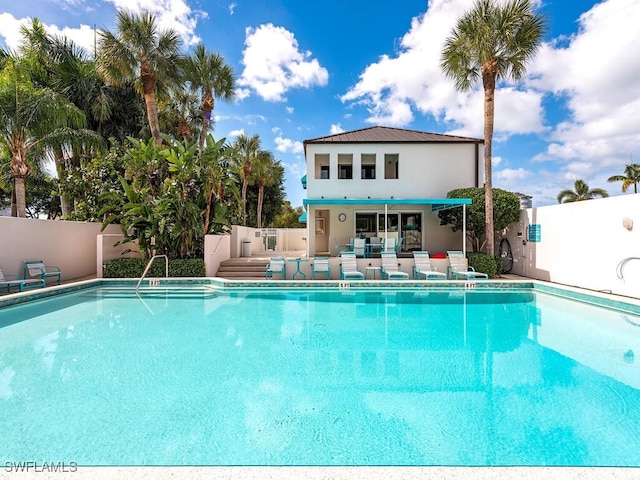 view of swimming pool with a patio