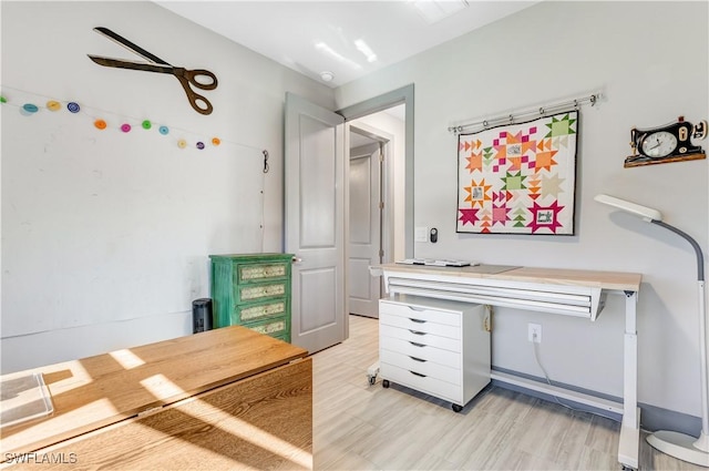 home office featuring light wood-type flooring