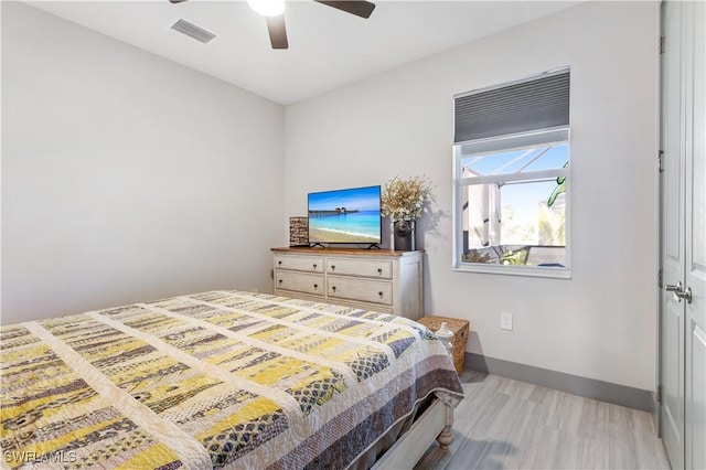 bedroom featuring ceiling fan and light hardwood / wood-style floors