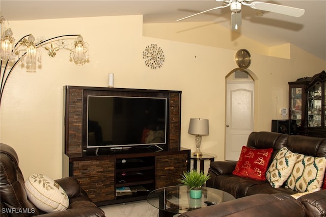 living room with ceiling fan and lofted ceiling