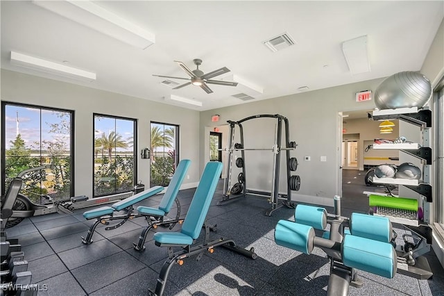 workout area with ceiling fan