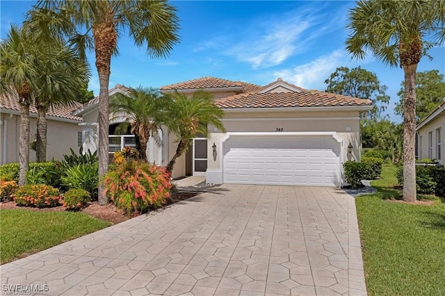 349 Harvard Ln, Naples, FL 34104 - mediterranean / spanish home with a garage