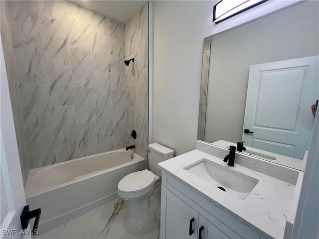 full bathroom featuring vanity, tiled shower / bath combo, and toilet