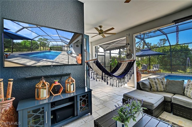 exterior space with exterior bar, a lanai, an outdoor hangout area, and a patio