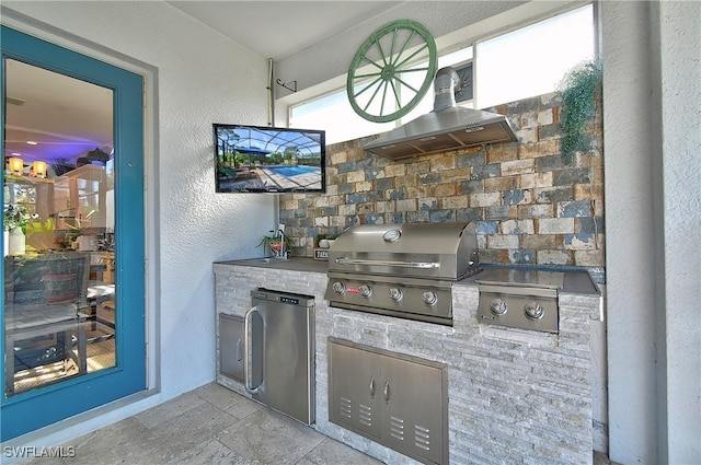 view of patio / terrace featuring an outdoor kitchen and area for grilling