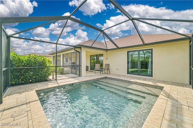 view of pool featuring a lanai and a patio