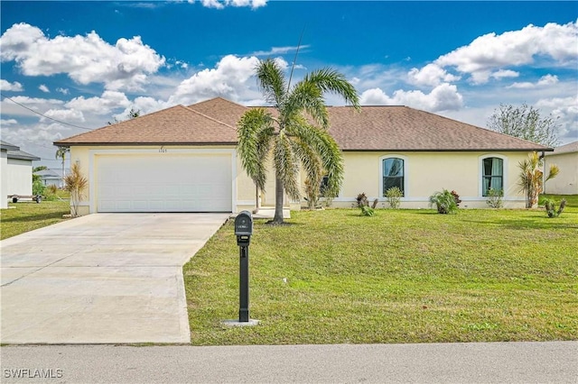 single story home featuring a garage and a front yard