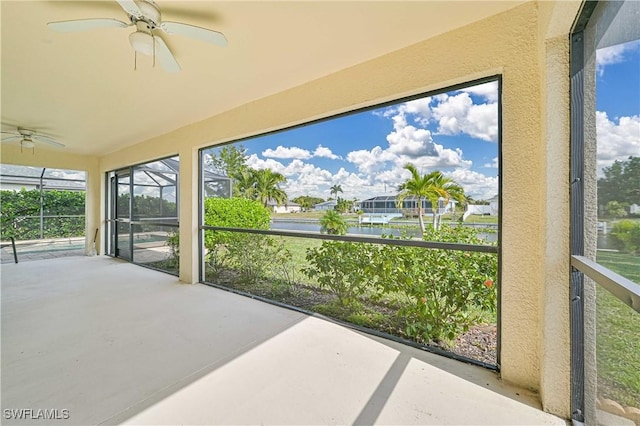 sunroom / solarium with ceiling fan