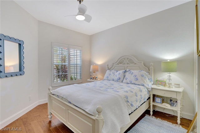 bedroom featuring ceiling fan and hardwood / wood-style floors