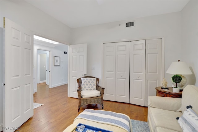 living area with wood-type flooring