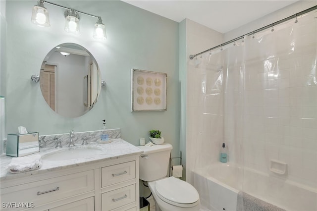 full bathroom featuring shower / bath combo with shower curtain, vanity, and toilet