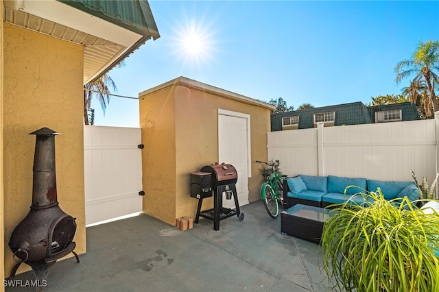 view of patio with a grill and an outdoor hangout area