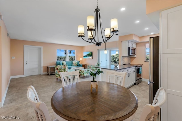 dining room with an inviting chandelier