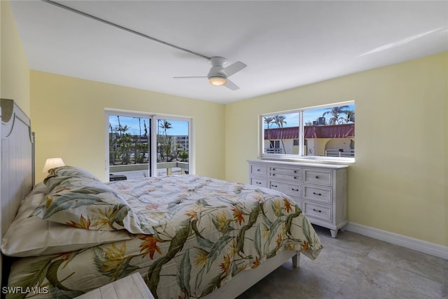 bedroom featuring access to exterior and ceiling fan