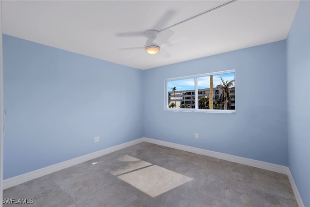 unfurnished room with ceiling fan