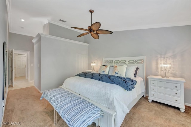 bedroom featuring ceiling fan, crown molding, and light colored carpet