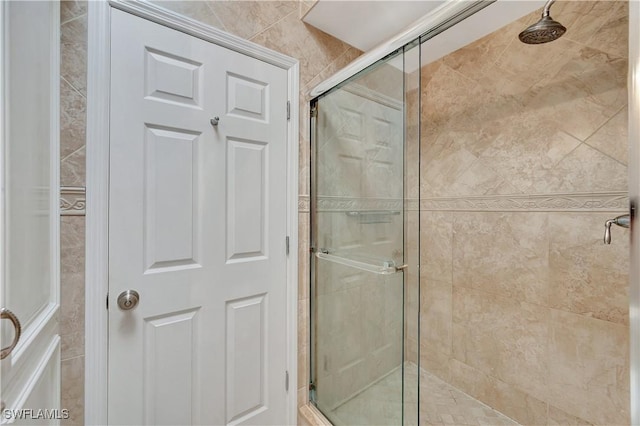 bathroom with an enclosed shower