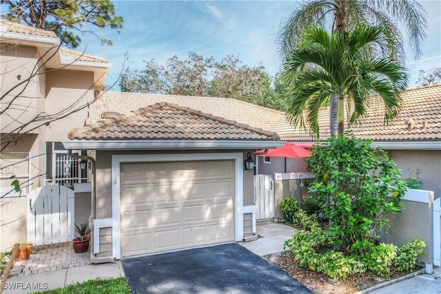 view of front of home with a garage