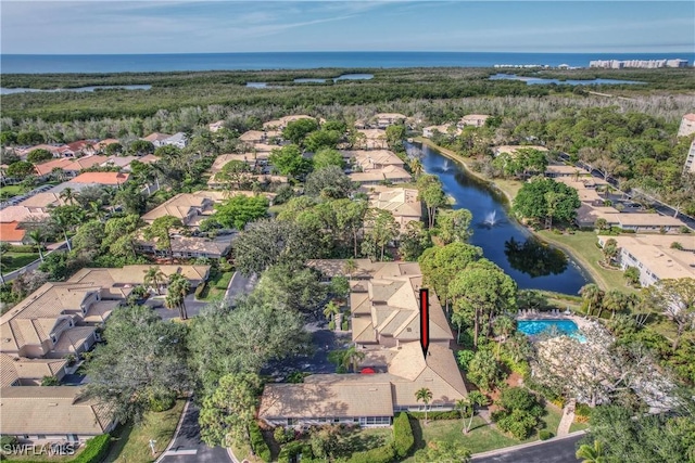 drone / aerial view with a water view