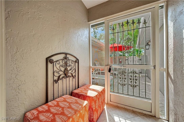 entryway featuring tile patterned flooring