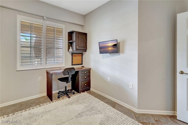 home office with light tile patterned floors