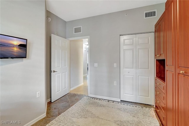 unfurnished bedroom featuring a closet