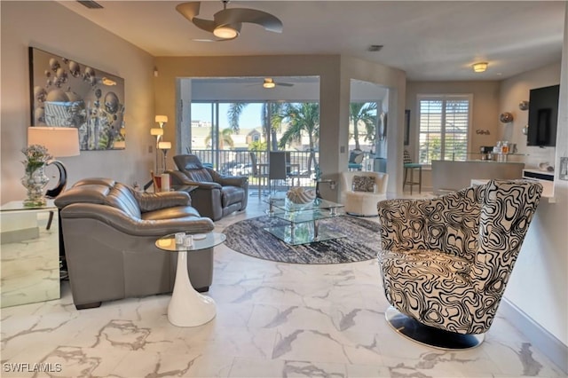 living room featuring ceiling fan