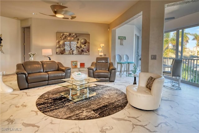 living room with ceiling fan