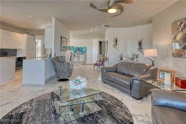 living room featuring ceiling fan