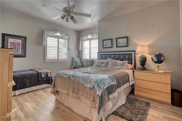 bedroom featuring ceiling fan and light hardwood / wood-style floors