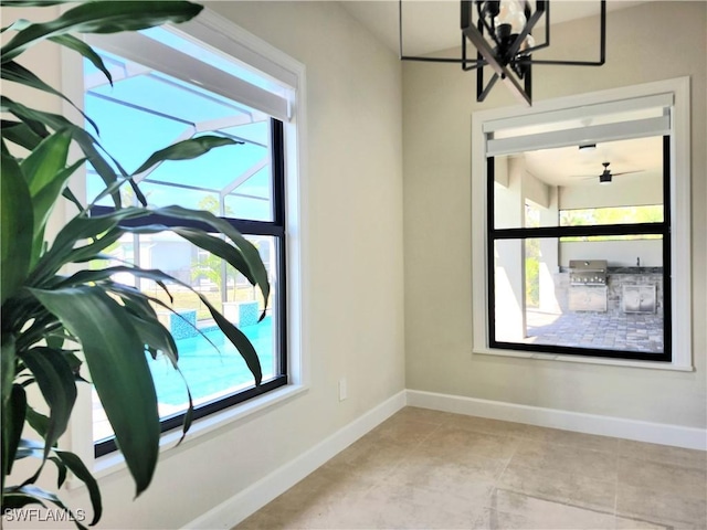 spare room with ceiling fan