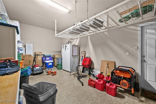 garage with freestanding refrigerator