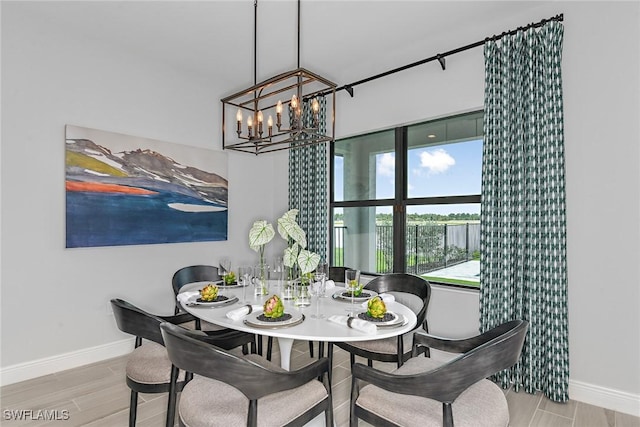 dining area with a notable chandelier