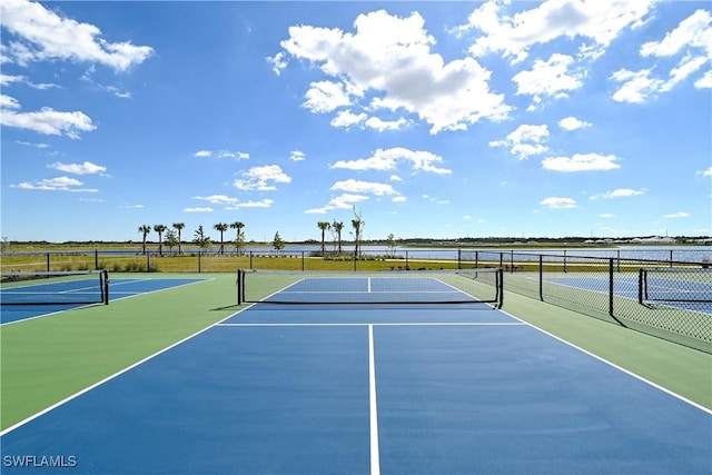 view of sport court with basketball hoop