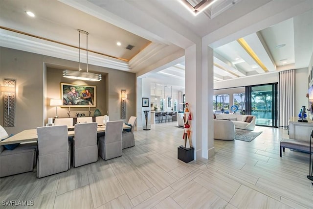 living room with light hardwood / wood-style flooring and beamed ceiling