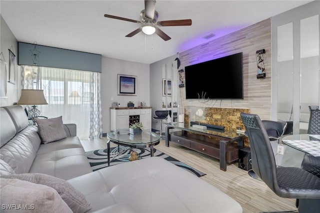 living room with ceiling fan