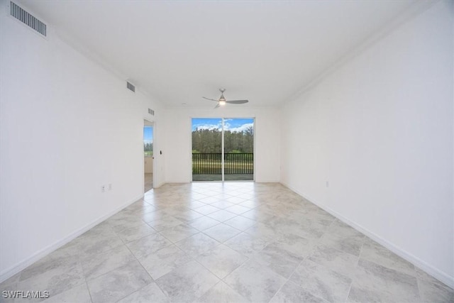 unfurnished room with ceiling fan, visible vents, baseboards, and light tile patterned flooring