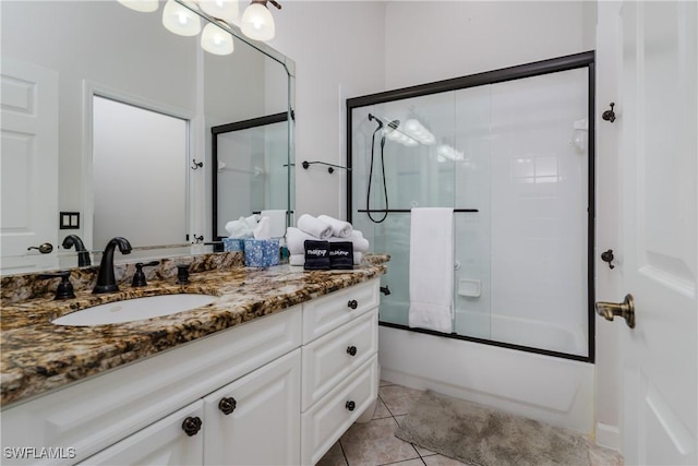 6750 Beach Resort Dr Unit 10, Naples, FL 34114 - full bath featuring shower / bath combination with glass door, tile patterned flooring, and vanity