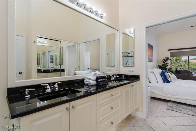 6750 Beach Resort Dr Unit 10, Naples, FL 34114 - ensuite bathroom featuring tile patterned floors, ensuite bathroom, double vanity, and a sink