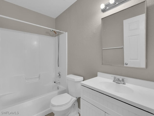 full bathroom with shower / bathing tub combination, vanity, and toilet