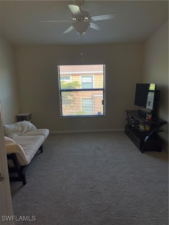 bedroom with ceiling fan and carpet floors