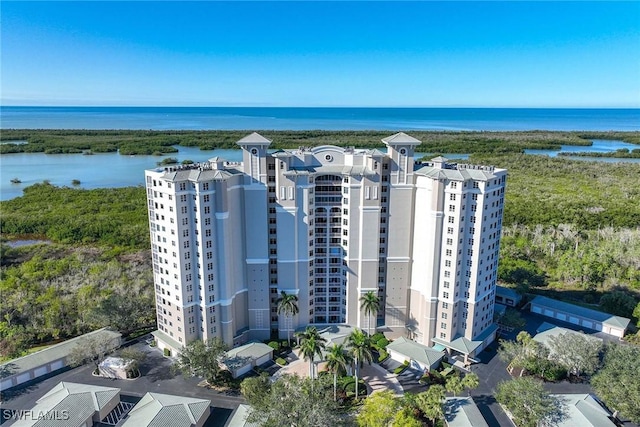 drone / aerial view with a water view