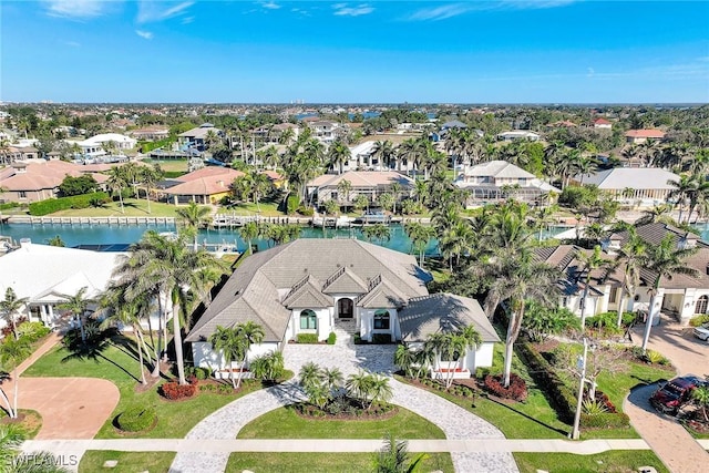 bird's eye view with a water view