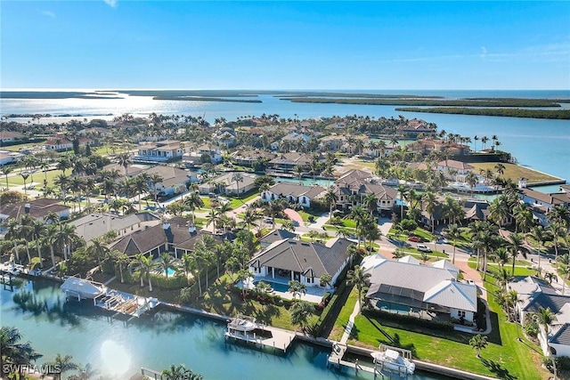 bird's eye view with a water view